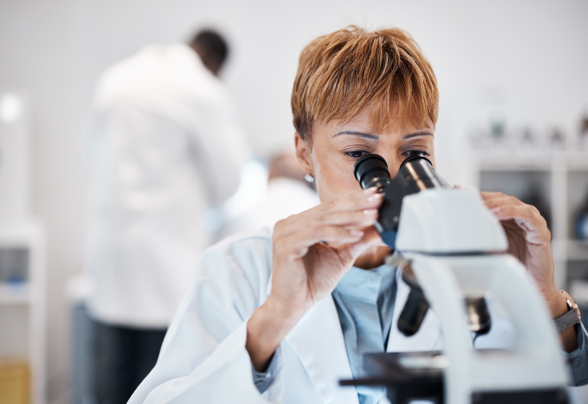 Female chemist working on cancer treatments